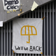 A poster of an umbrella with the words "We'll be back" written underneath is pictured on a wall at the main "Occupy" protest site at Admiralty in Hong Kong